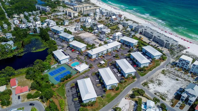 an aerial view of a house roof deck patio and outdoor seating