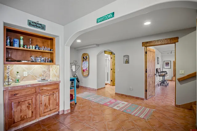 a view of an entryway with wooden floor