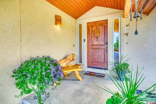 a backyard of a house with seating space
