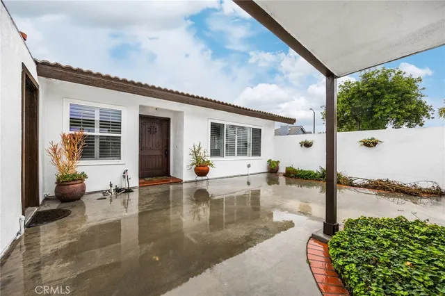 a view of a porch with furniture