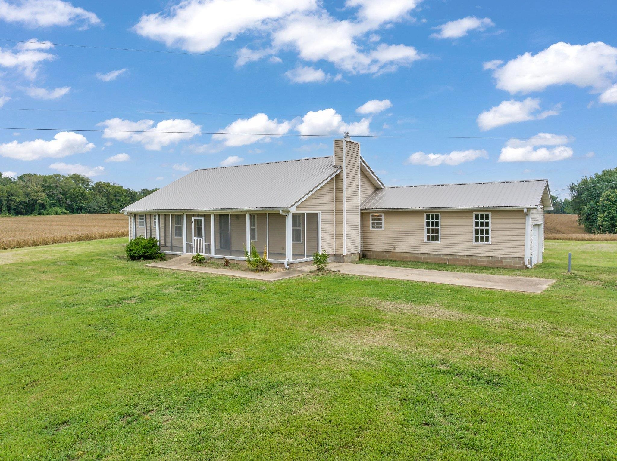 276 Mcbroom Road Henning, TN 38041 - Photo 1 of 36 View of front of property with a front lawn and a patio