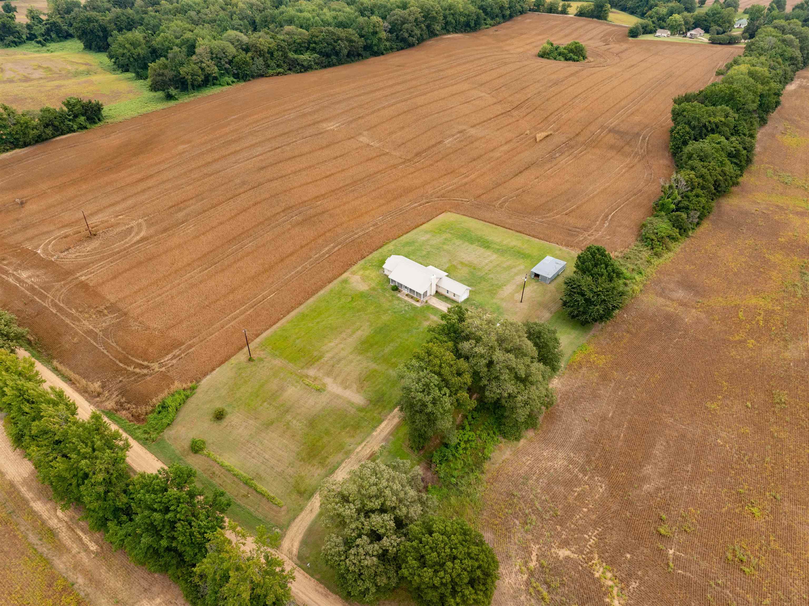 276 Mcbroom Road Henning, TN 38041 - Photo 34 of 36 Drone / aerial view with a rural view