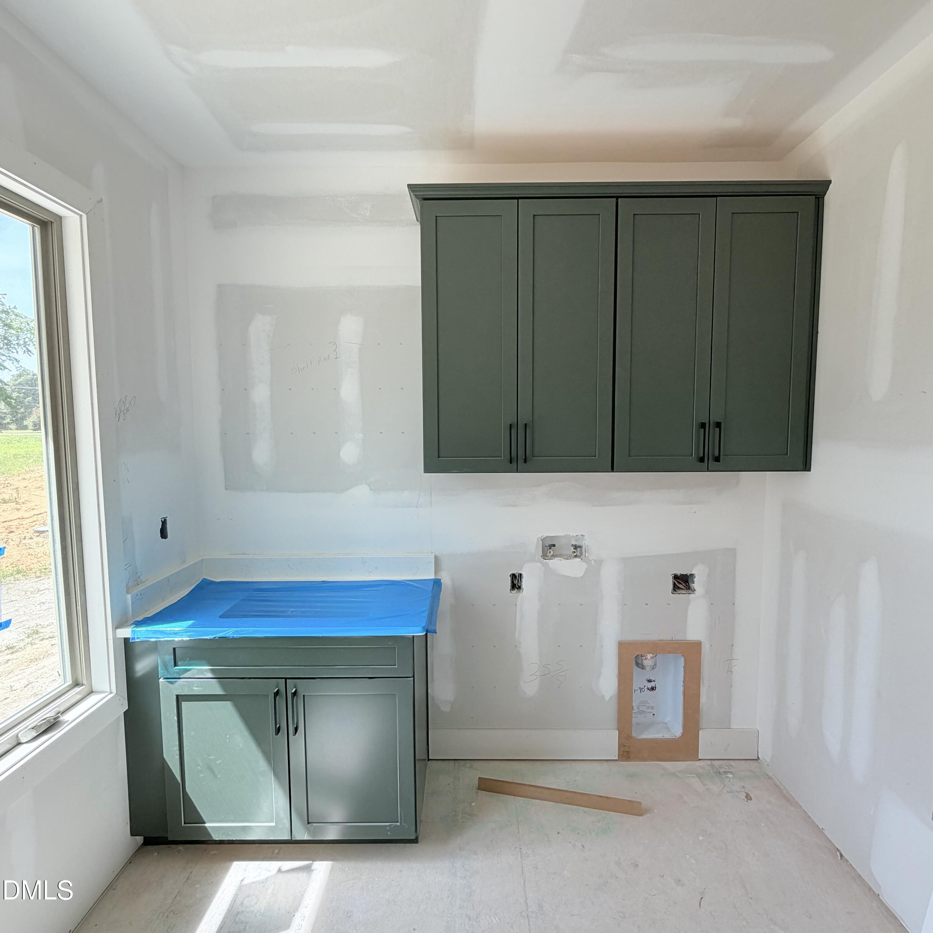 50 Wiggins Road Louisburg, NC 27549 - Photo 18 of 26 Laundry room