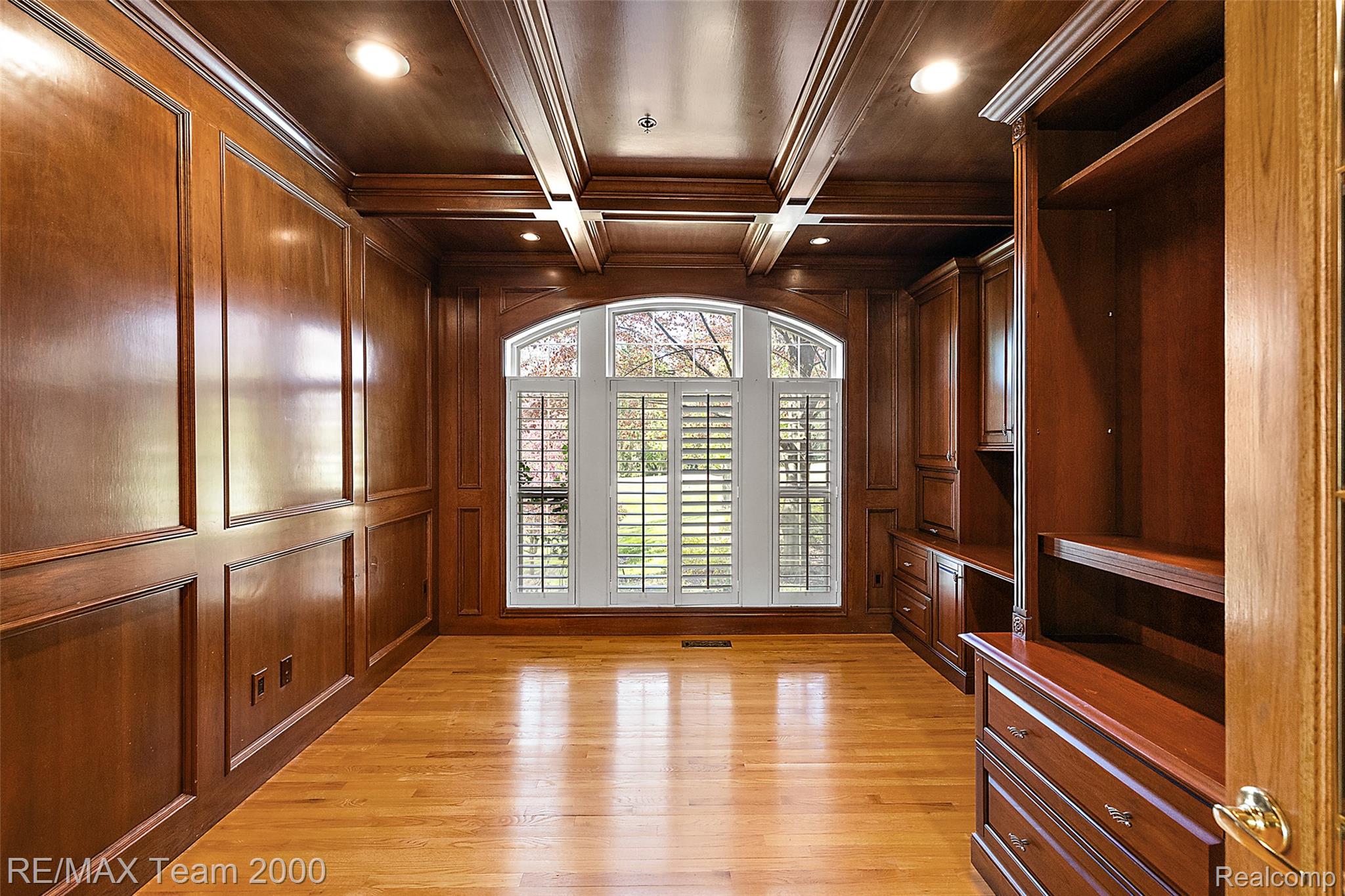 630 Sheldon Court Rochester, MI 48306 - Photo 48 of 94 Walk in closet featuring light wood-style flooring and coffered ceiling