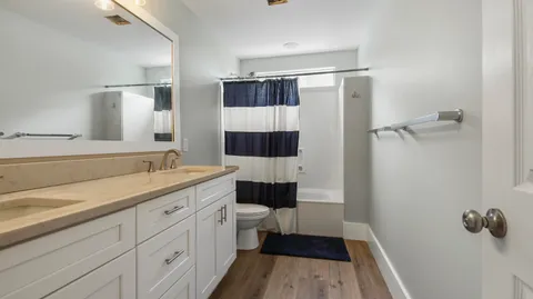 a bathroom with a sink and mirror