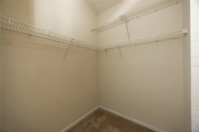 a view of a room with racks on the wall