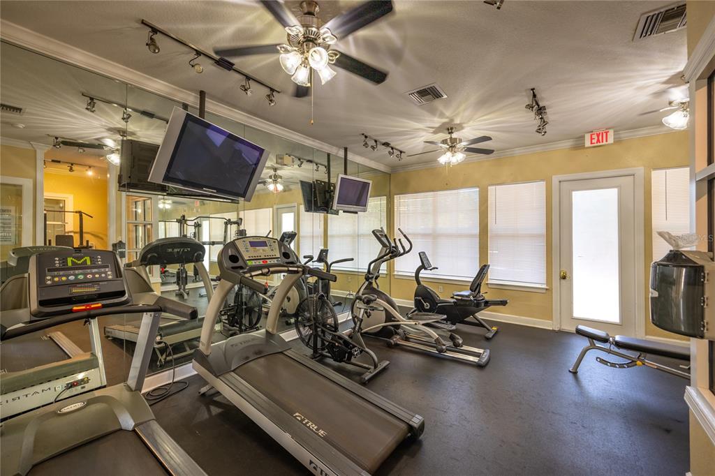 4872 Northwest 42nd Road, Unit 105 Gainesville, FL 32606 - Photo 38 of 38 a view of a room with gym equipment