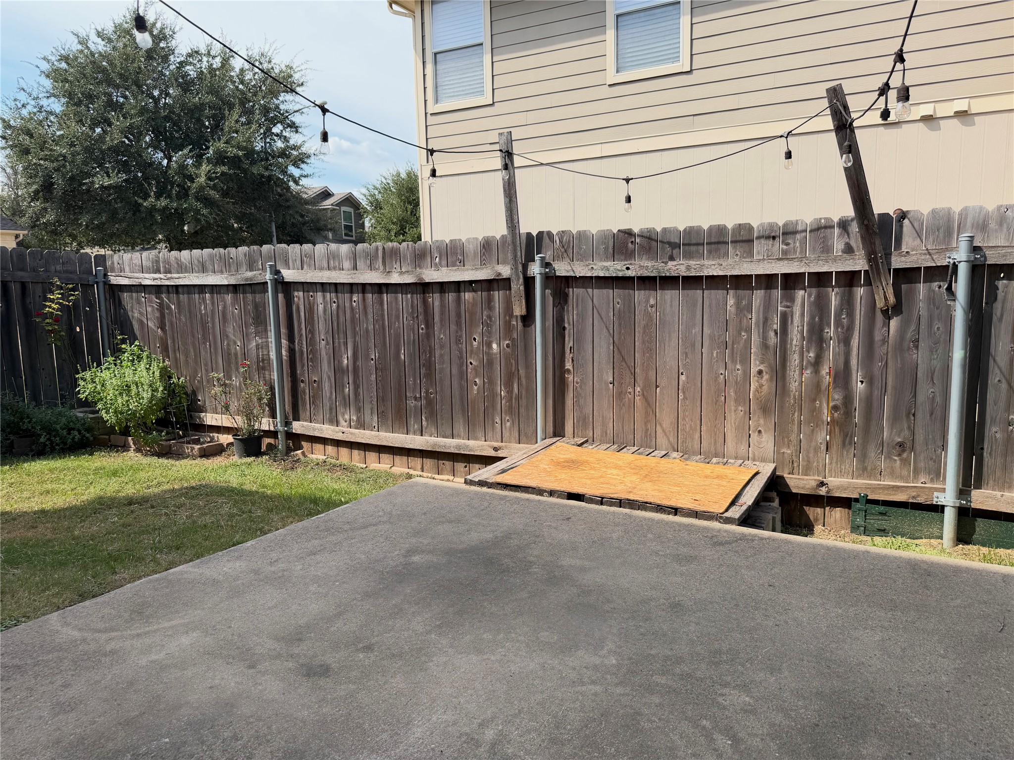 14504 Harris Ridge Boulevard, Unit B Pflugerville, TX 78660 - Photo 23 of 29 Walk from the dining area into your own private backyard.