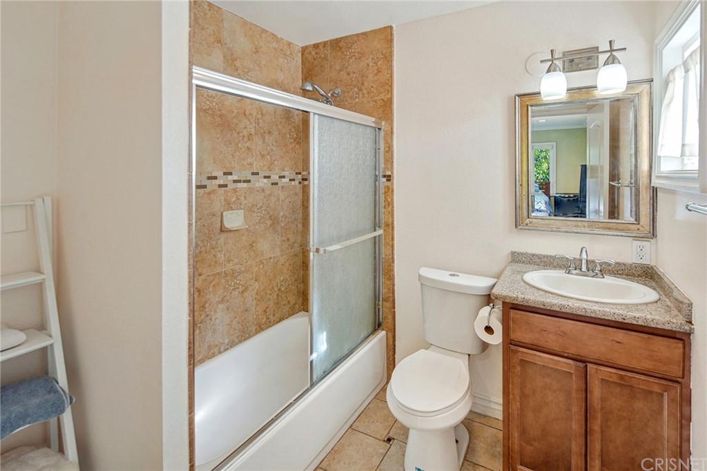 7320 Lennox Avenue, Unit H1 Van Nuys, CA 91405 - Photo 17 of 20 a bathroom with a sink toilet and shower