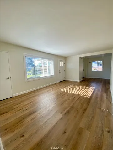 a view of an empty room and window