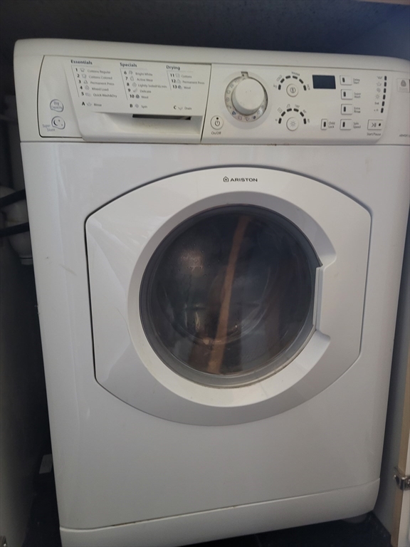 11 Phillips Street, Unit 8 Boston, MA 02114 - Photo 13 of 14 a utility room with dryer and washer