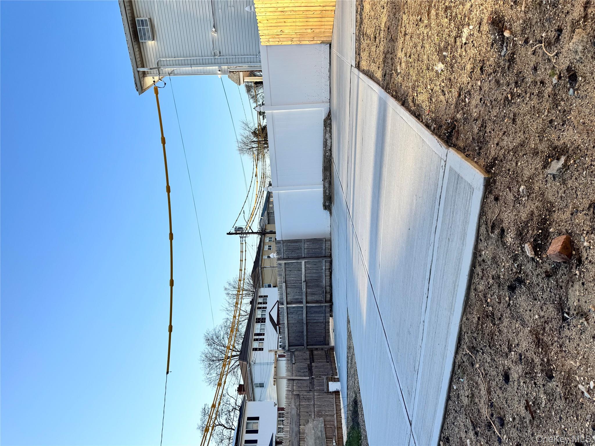 259-07 147th Road Queens, NY 11422 - Photo 16 of 27 View of yard featuring fence