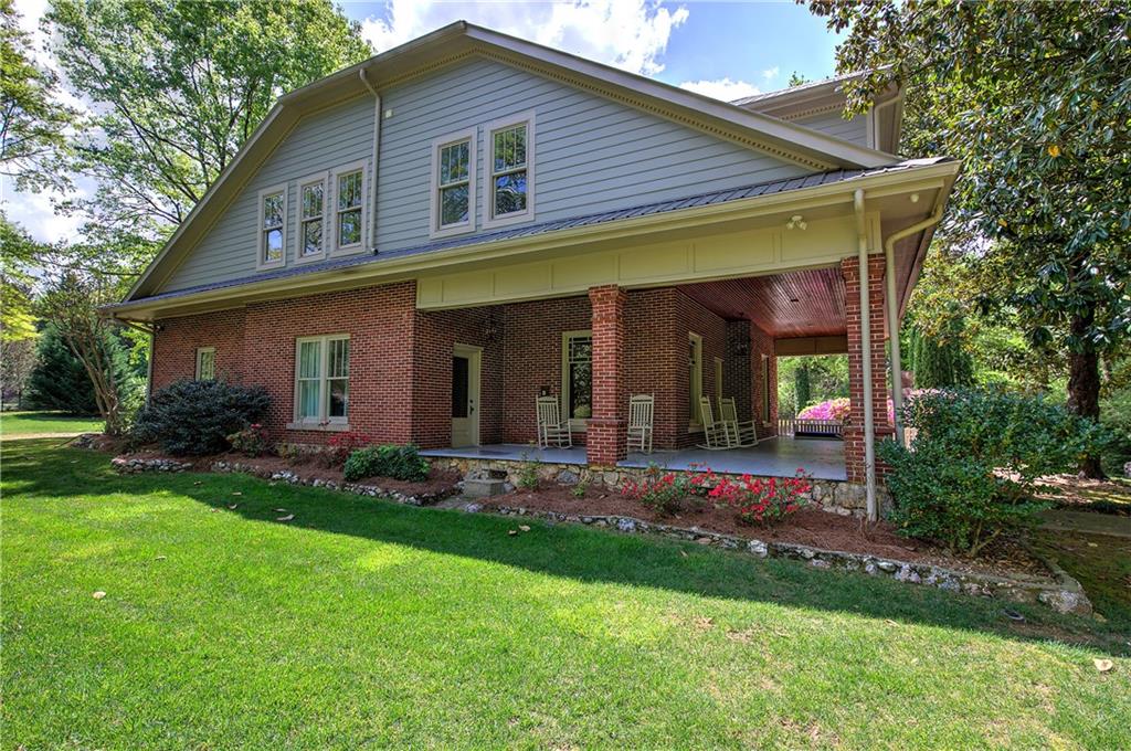 421 Boulevard Heights Calhoun, GA 30701 - Photo 13 of 96 a view of a house with garden