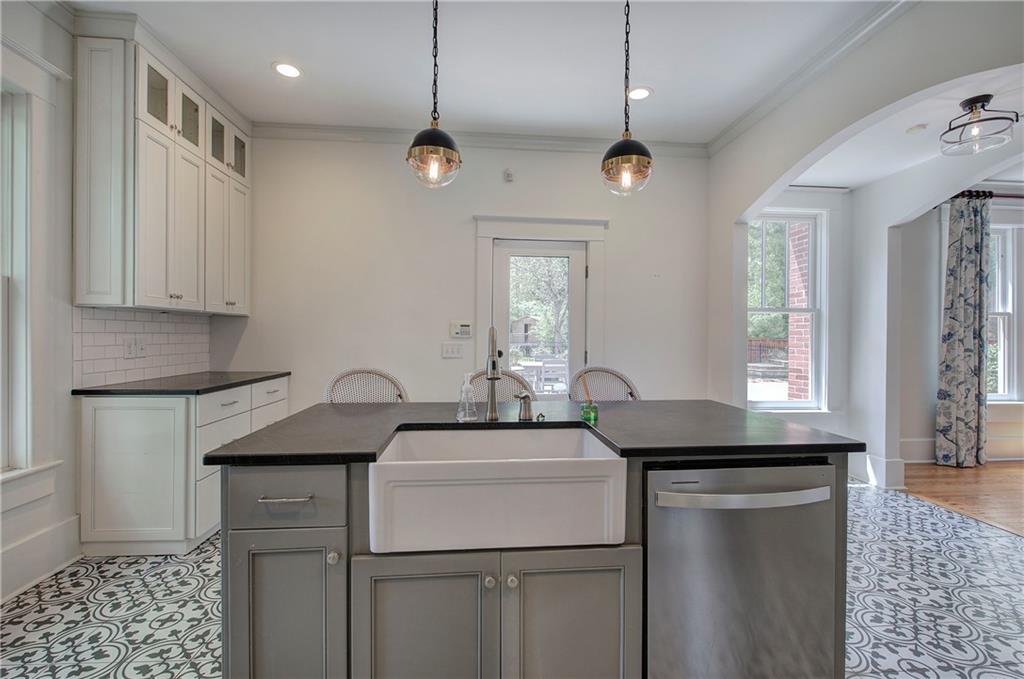 421 Boulevard Heights Calhoun, GA 30701 - Photo 26 of 96 a kitchen with a sink stove and window