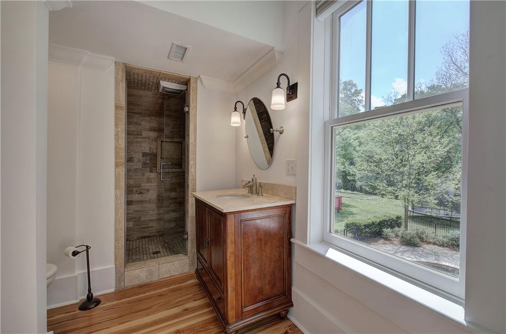 421 Boulevard Heights Calhoun, GA 30701 - Photo 57 of 96 a bathroom with a sink a mirror and window
