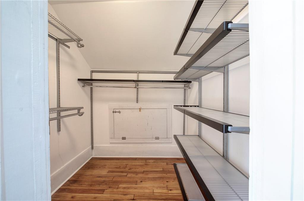 421 Boulevard Heights Calhoun, GA 30701 - Photo 59 of 96 a view of a hallway with wooden floor and staircase