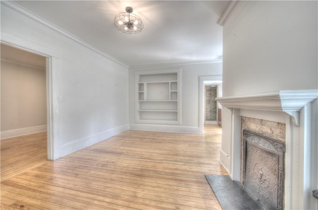 421 Boulevard Heights Calhoun, GA 30701 - Photo 60 of 96 a view of an empty room with a fireplace and a window