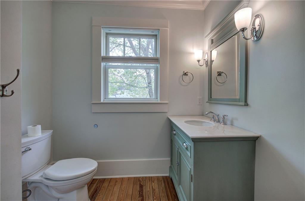 421 Boulevard Heights Calhoun, GA 30701 - Photo 66 of 96 a bathroom with a sink toilet and a mirror