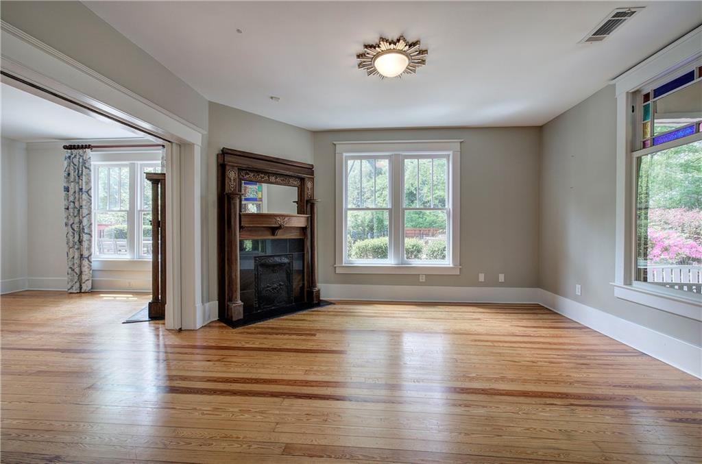 421 Boulevard Heights Calhoun, GA 30701 - Photo 73 of 96 an empty room with wooden floor and windows