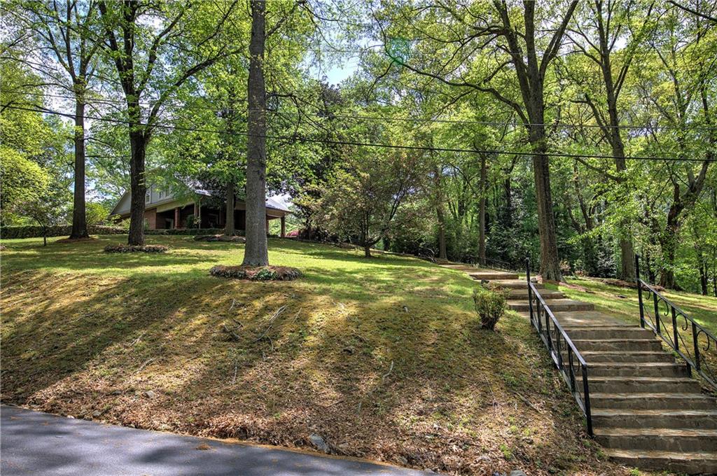 421 Boulevard Heights Calhoun, GA 30701 - Photo 87 of 96 a view of a park with large trees