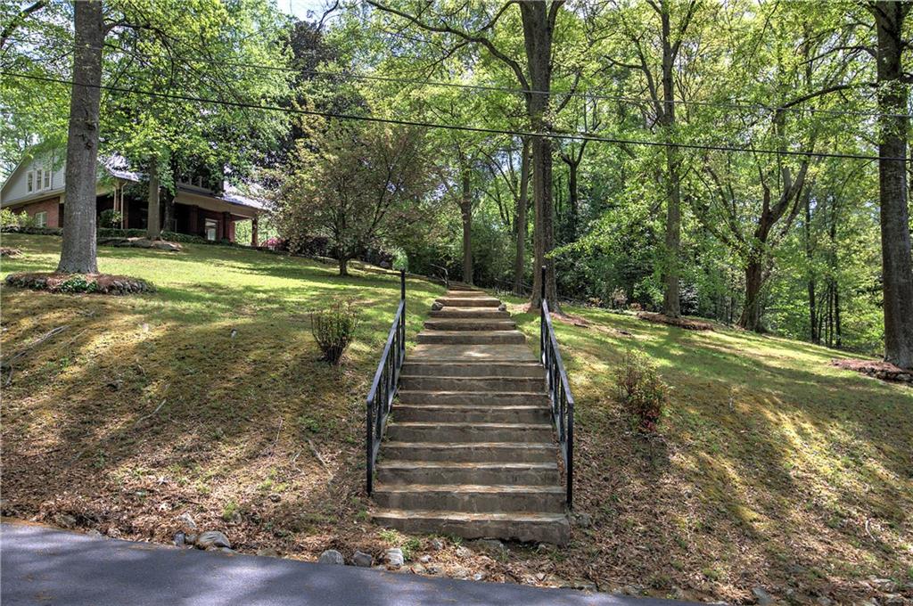 421 Boulevard Heights Calhoun, GA 30701 - Photo 92 of 96 a view of a yard with plants and large trees