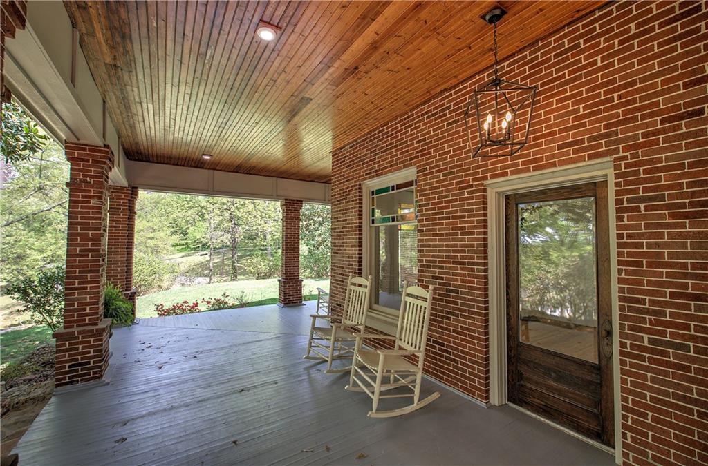 421 Boulevard Heights Calhoun, GA 30701 - Photo 10 of 96 a view of livingroom with furniture and floor to ceiling window