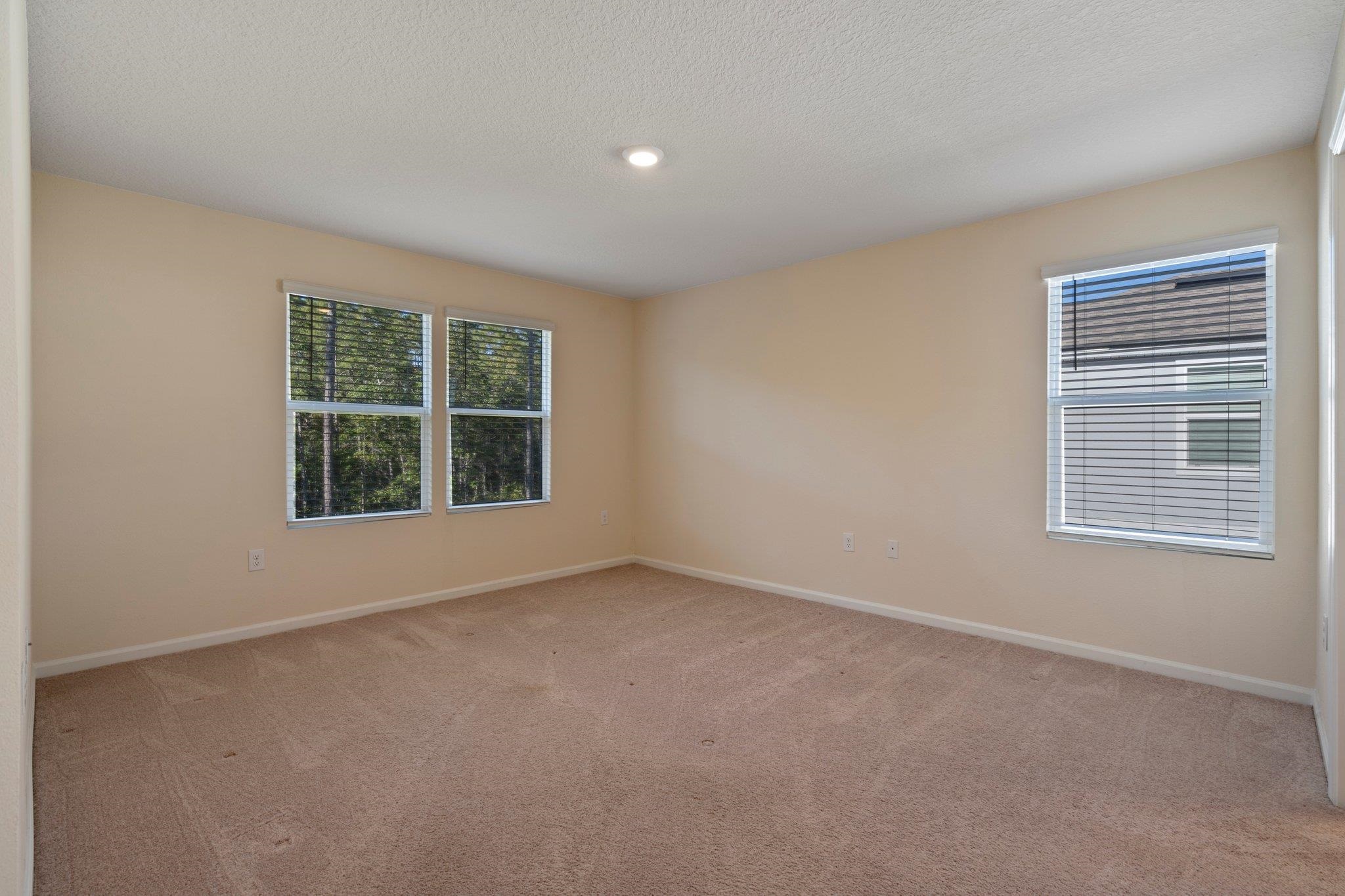 553 Coastline Way Street St. Augustine, FL 32092 - Photo 13 of 35 a view of an empty room with a window