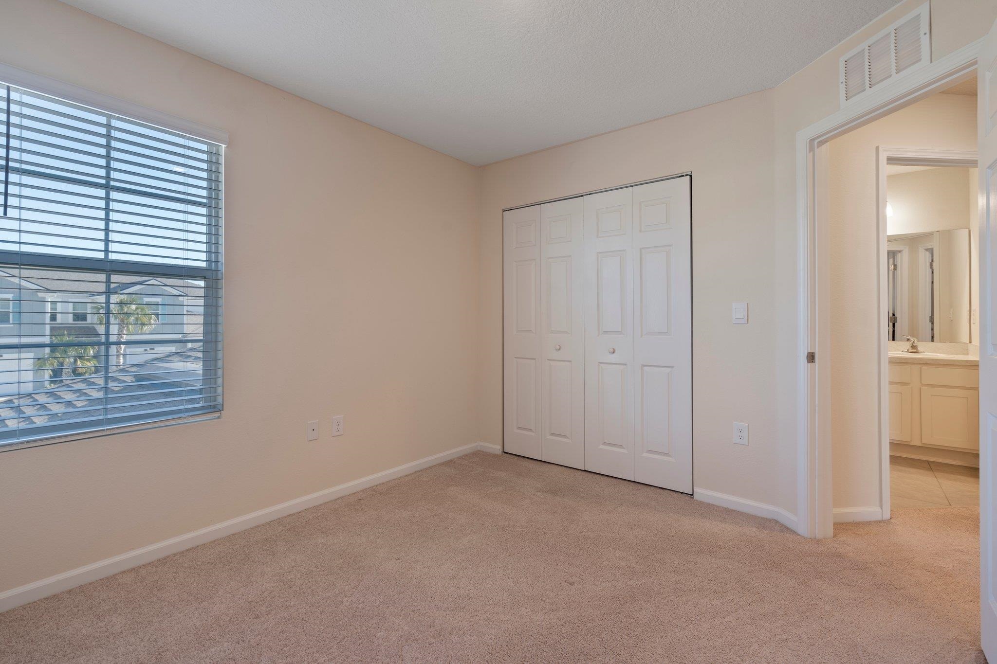 553 Coastline Way Street St. Augustine, FL 32092 - Photo 18 of 35 an empty room with windows