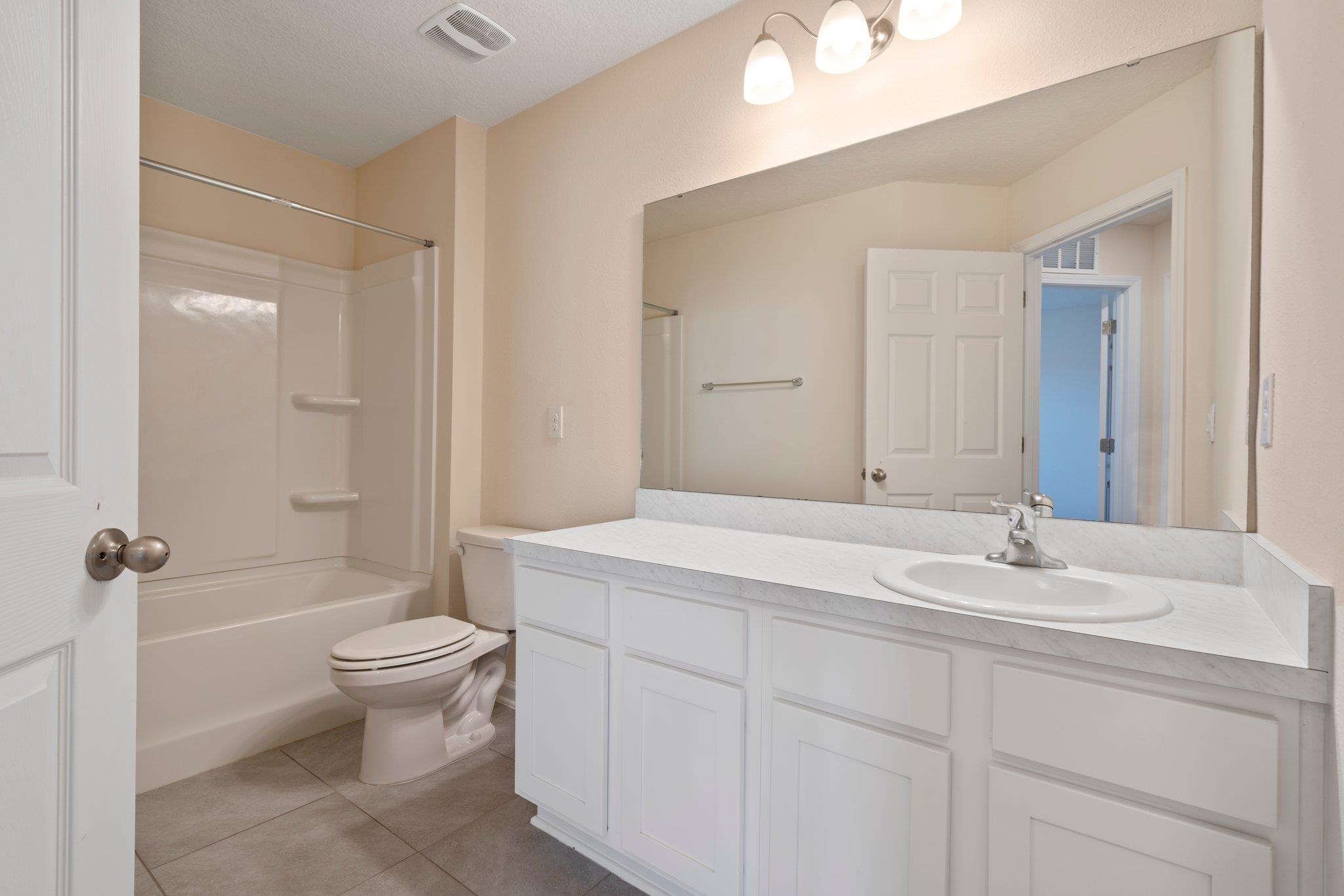 553 Coastline Way Street St. Augustine, FL 32092 - Photo 20 of 35 a bathroom with a sink toilet and shower