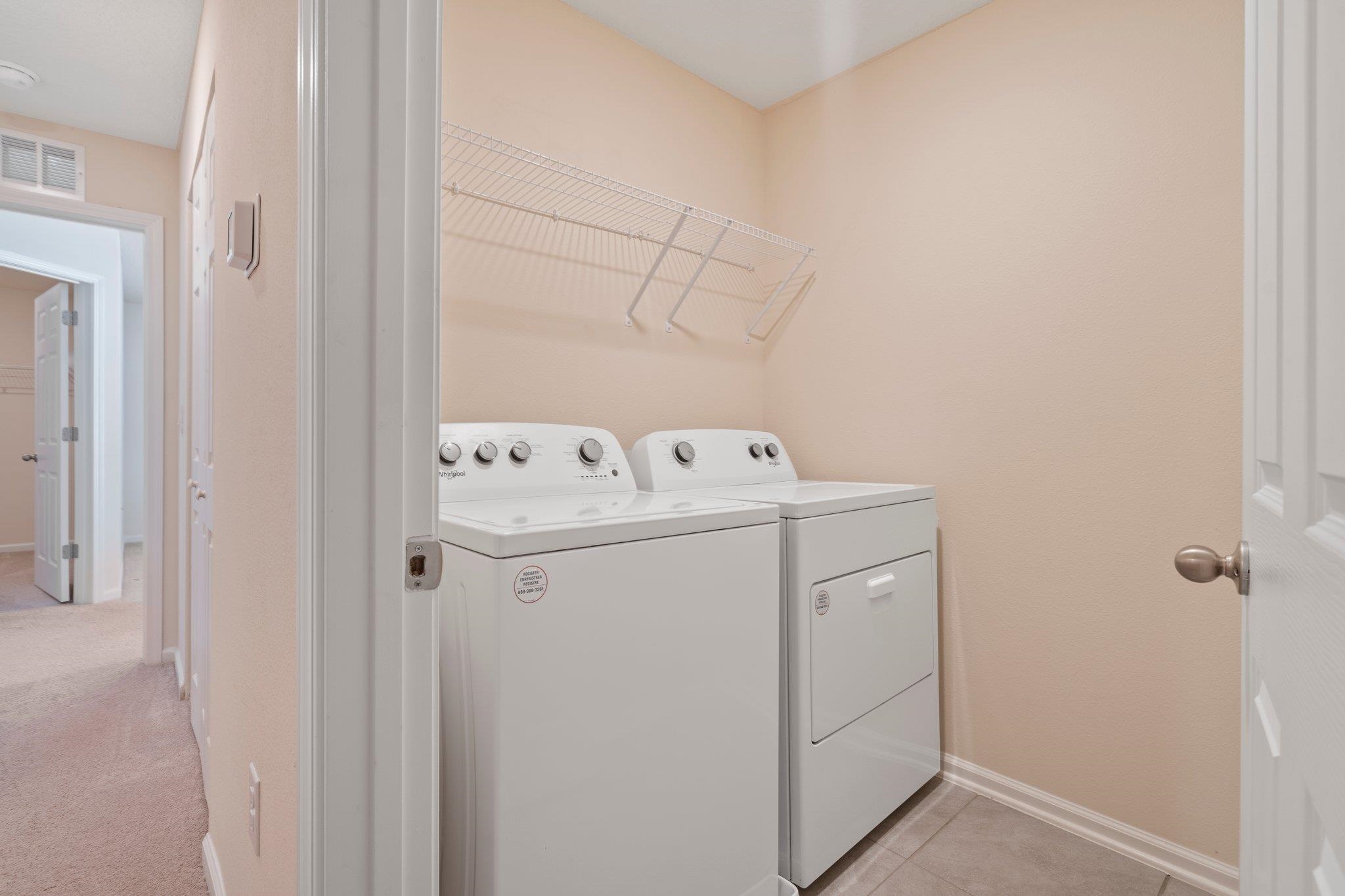 553 Coastline Way Street St. Augustine, FL 32092 - Photo 21 of 35 a utility room with dryer and washer