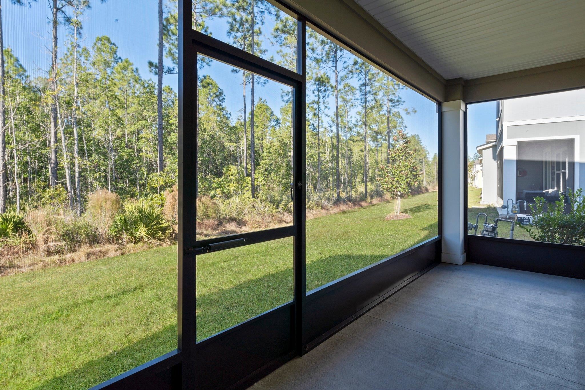 553 Coastline Way Street St. Augustine, FL 32092 - Photo 23 of 35 a view of an outdoor space with a ocean from a window