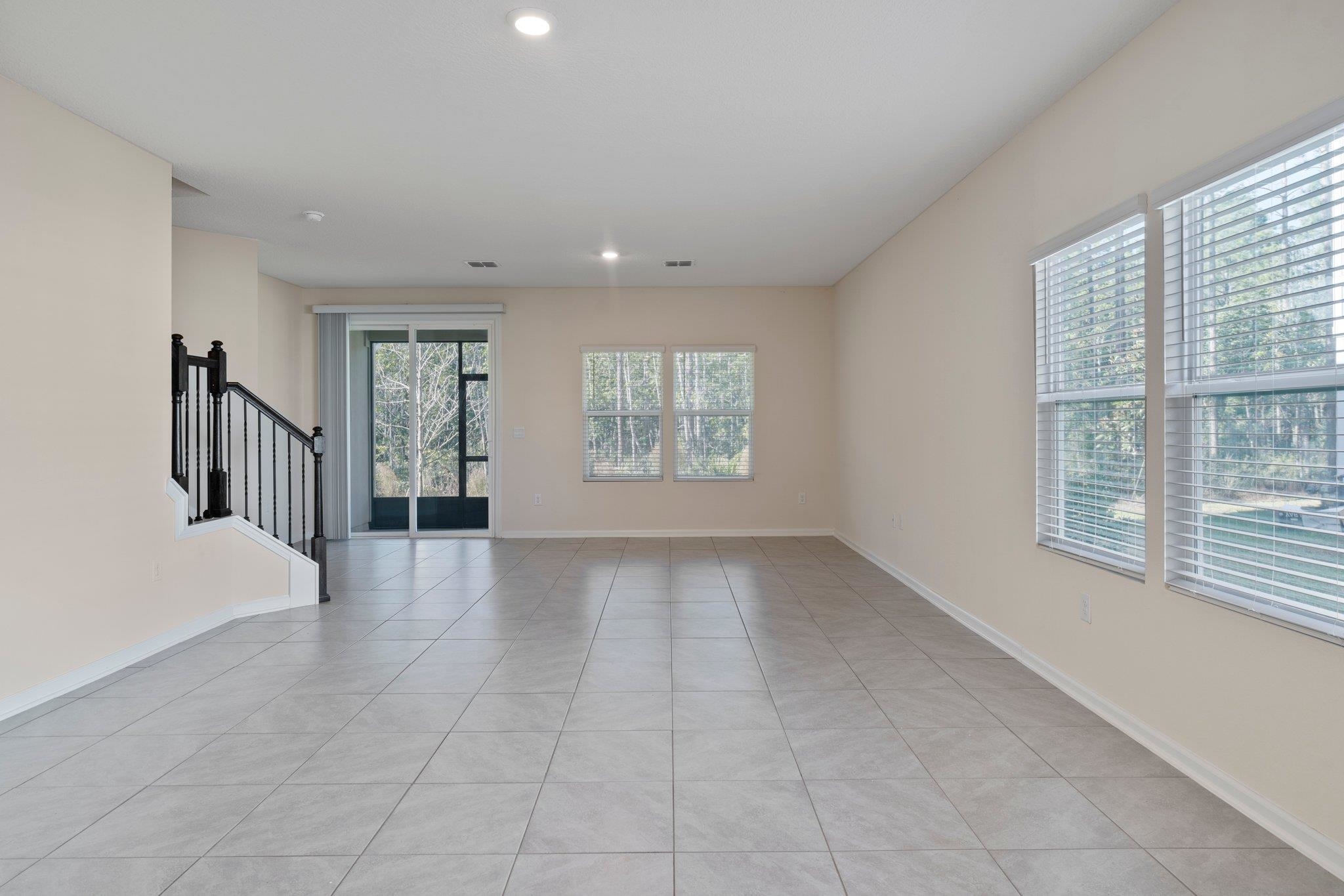 553 Coastline Way Street St. Augustine, FL 32092 - Photo 9 of 35 a view of an empty room with a window