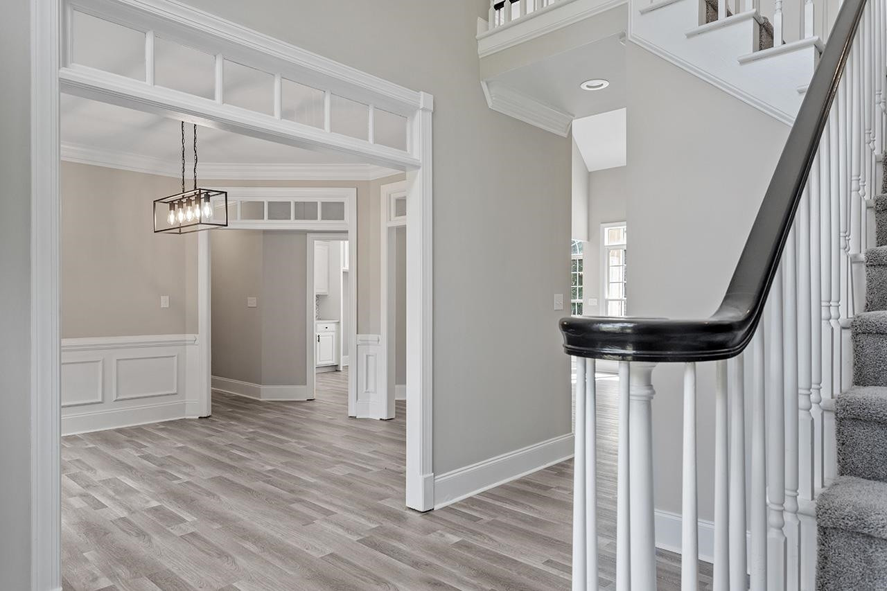170 Fleming Forest Drive Youngsville, NC 27596 - Photo 15 of 42 a view of entryway and hall with wooden floor