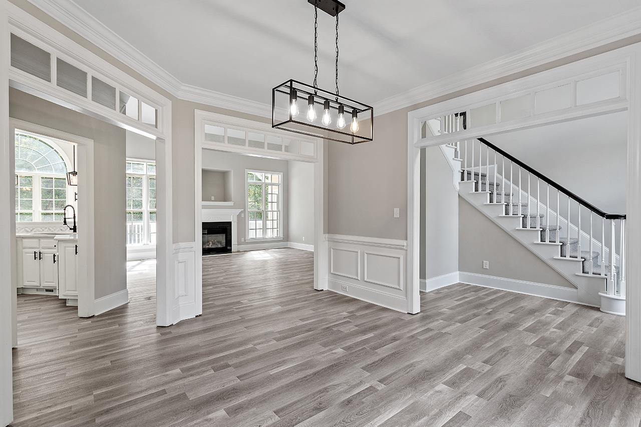 170 Fleming Forest Drive Youngsville, NC 27596 - Photo 17 of 42 a view of an entryway with wooden floor