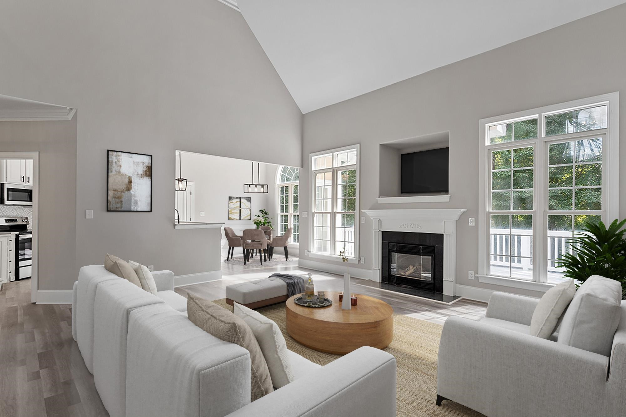 170 Fleming Forest Drive Youngsville, NC 27596 - Photo 2 of 42 a living room with furniture a fireplace and a flat screen tv