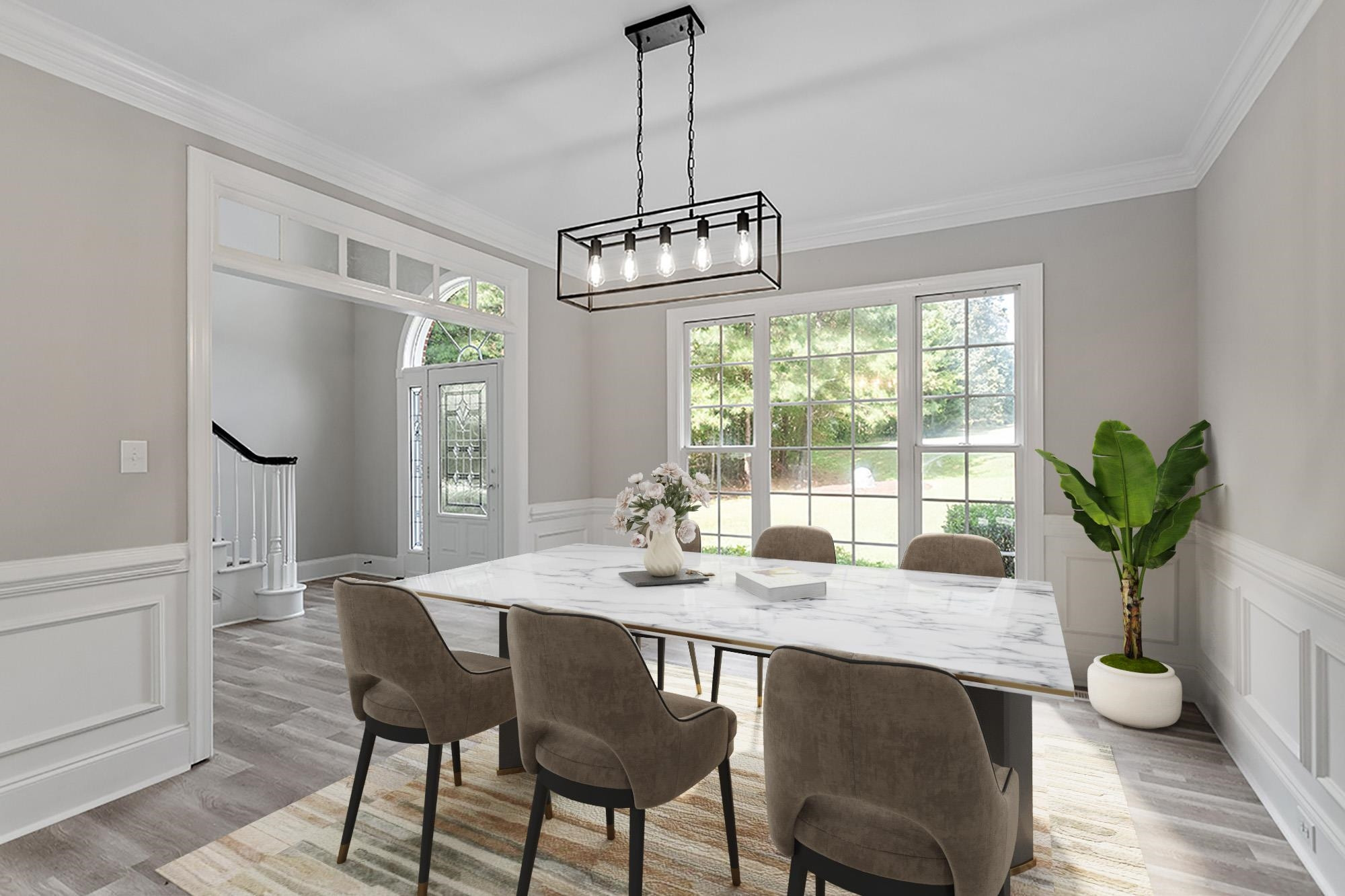 170 Fleming Forest Drive Youngsville, NC 27596 - Photo 5 of 42 a dining room with furniture potted plants and wooden floor