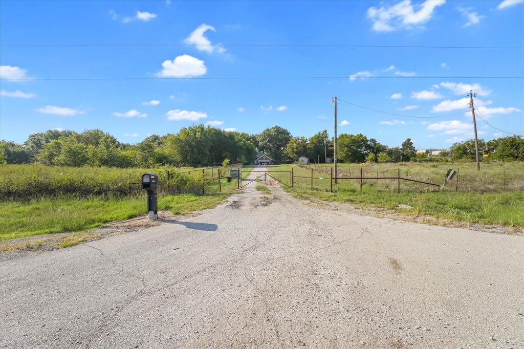 4002 E Highway Decatur, TX 76234 - Photo 5 of 5 a view of a road with a yard
