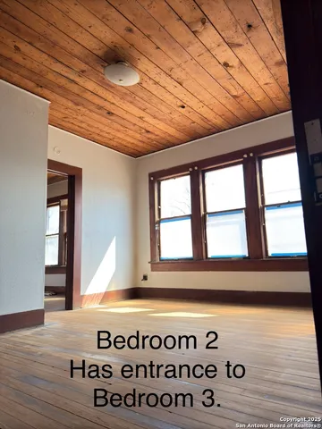 a bathroom with a tub and a shower