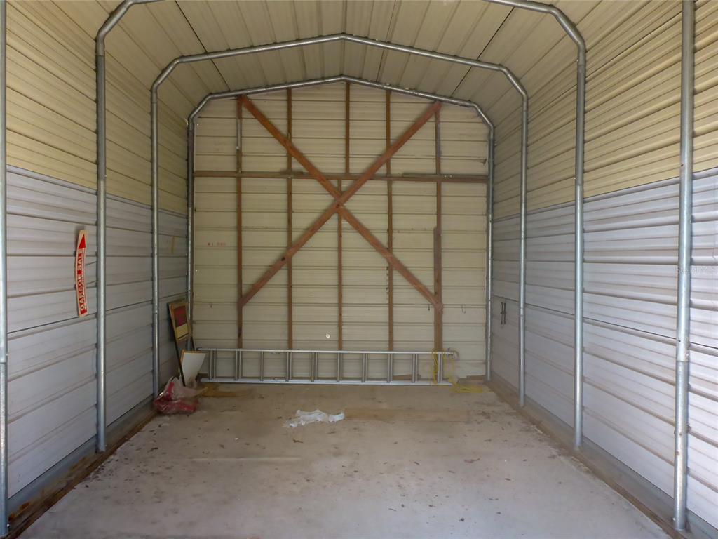 12271 Centralia Road Weeki Wachee, FL 34614 - Photo 32 of 36 a view of a room with storage