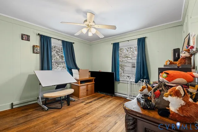 a room with furniture and wooden floor