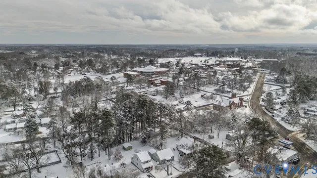 a kitchen with a refrigerator and a sink