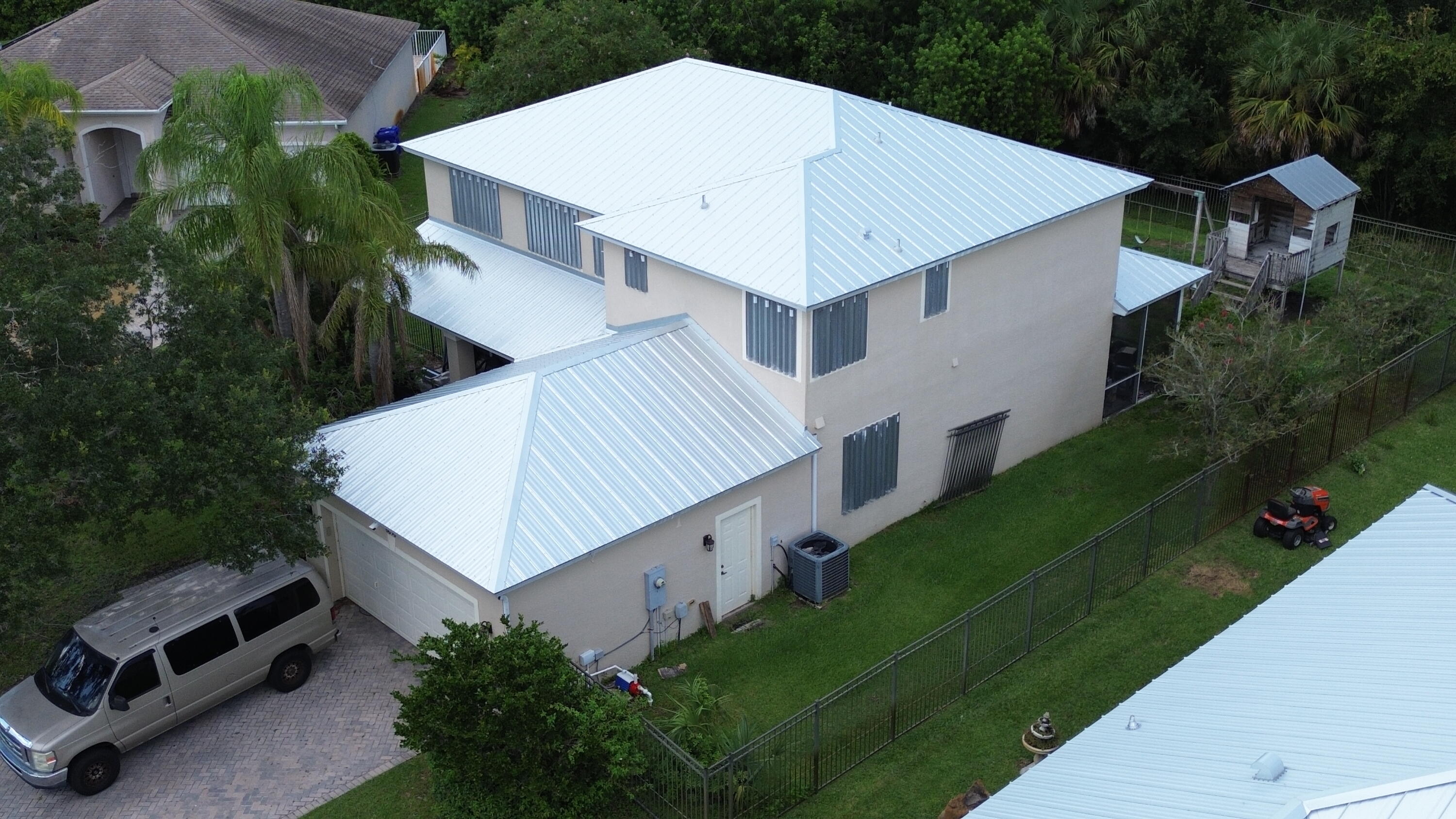6090 46th Lane Vero Beach, FL 32967 - Photo 11 of 34 an aerial view of a house having yard