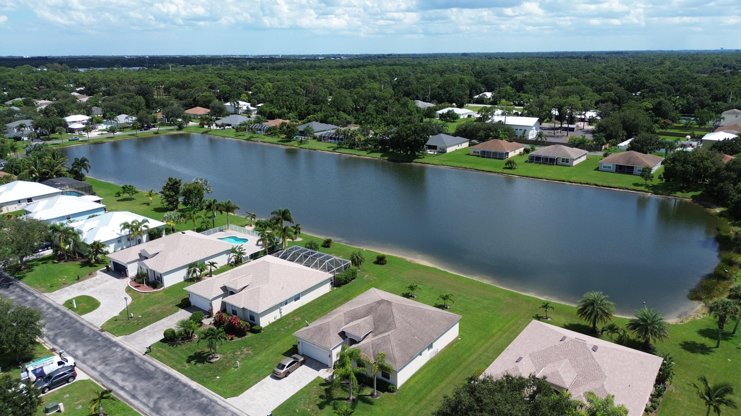 6090 46th Lane Vero Beach, FL 32967 - Photo 17 of 34 an aerial view of residential houses with outdoor space and river
