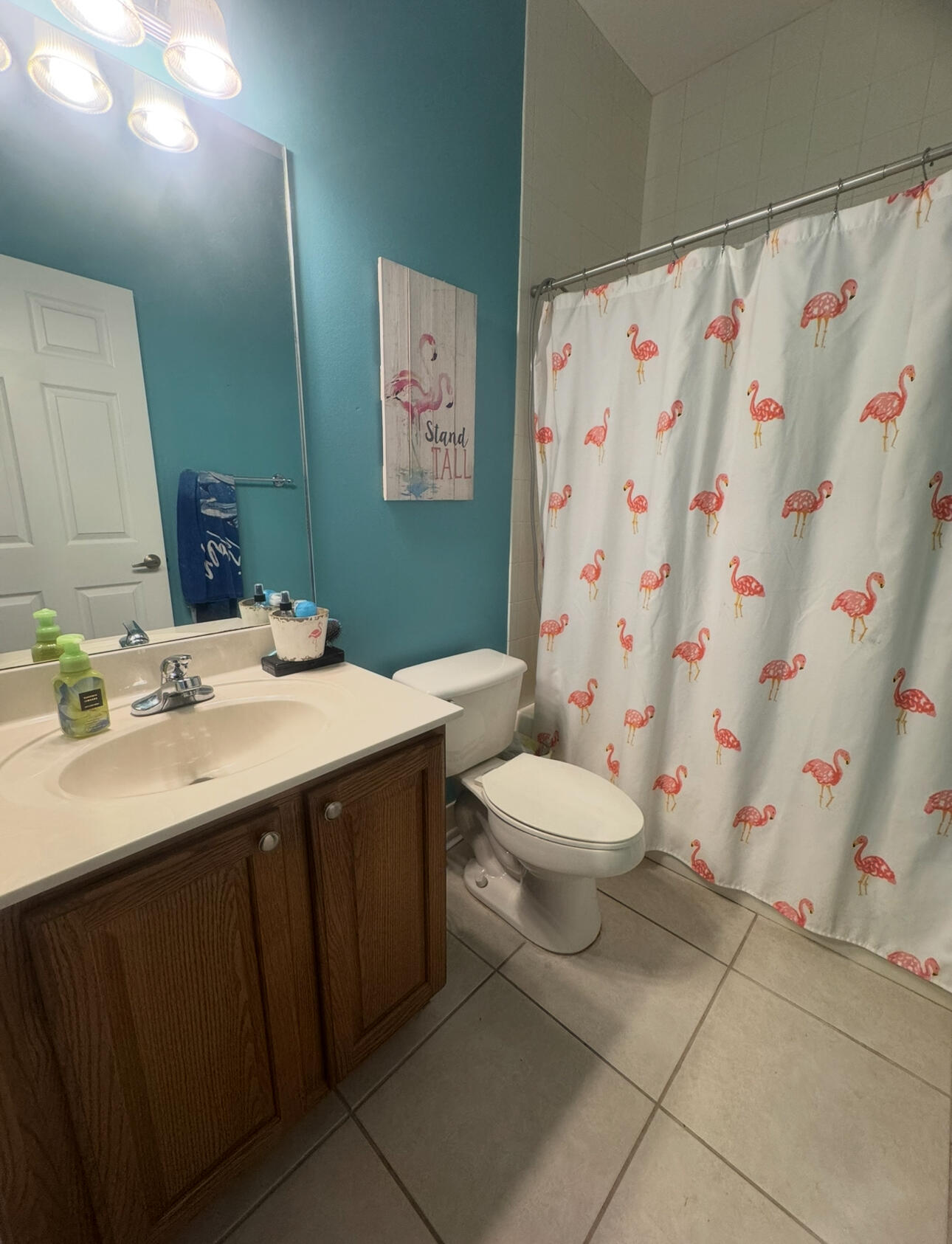 6090 46th Lane Vero Beach, FL 32967 - Photo 33 of 34 a bathroom with a sink toilet and shower