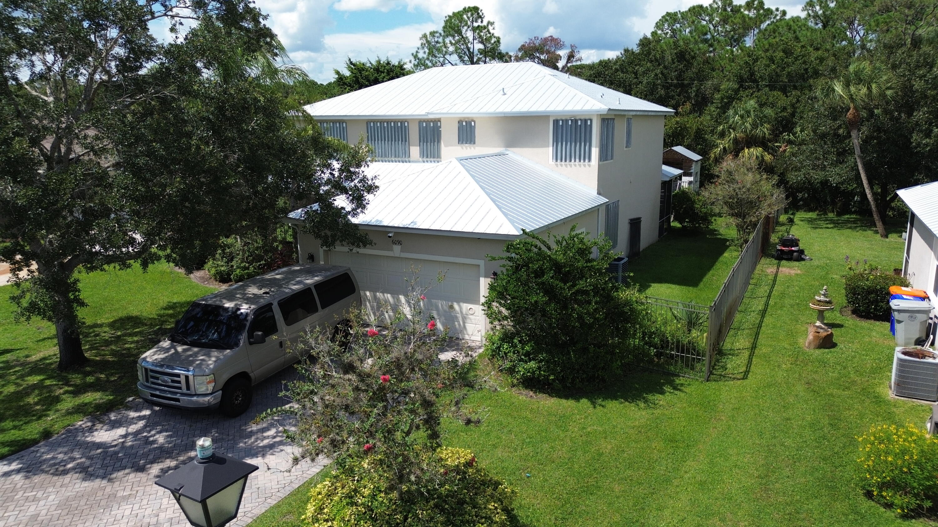 6090 46th Lane Vero Beach, FL 32967 - Photo 6 of 34 a aerial view of a house with a yard and sitting area
