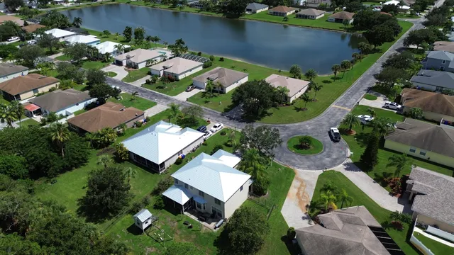 an aerial view of a house having yard