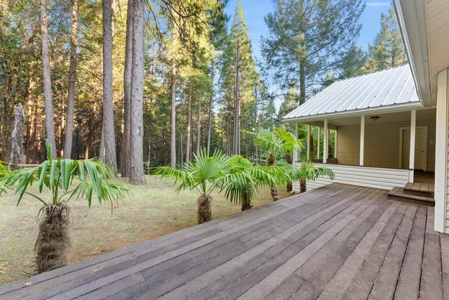 a view of a kitchen with a sink and a window