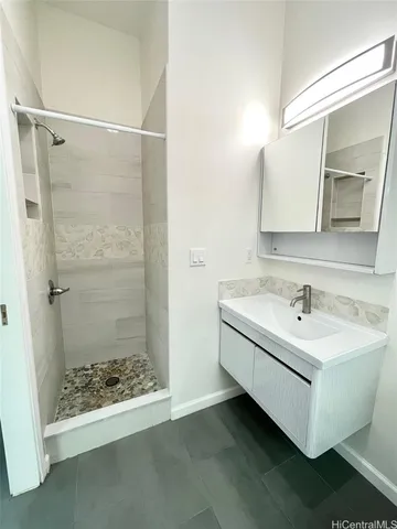 a bathroom with a bathtub and a sink