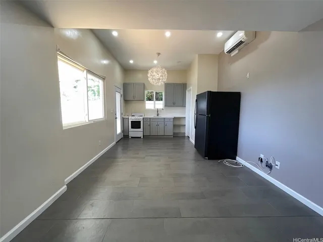 a view of kitchen with windows