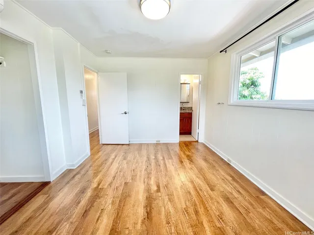 a view of an empty room and window